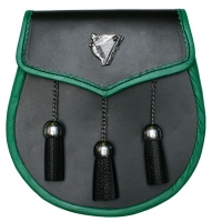 Metal Lady & Harp badge on the flap Edges bound in green leather Opens