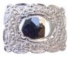 Chrome buckle with thistle design.